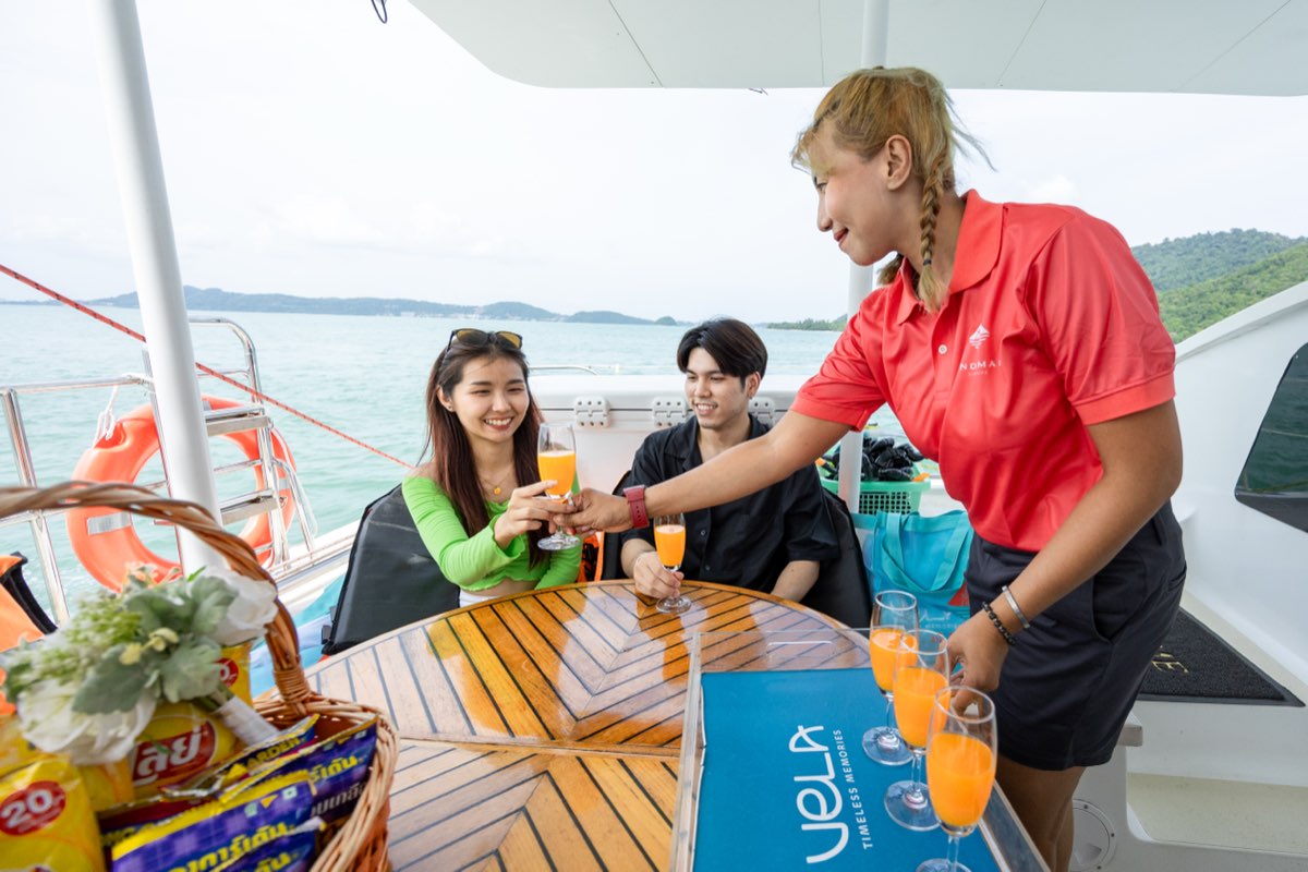 Guests aboard Vela Charter catamaran Phuket